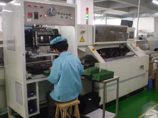 Circuit boards beside an assembly workstation